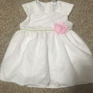 White dress with pink flower